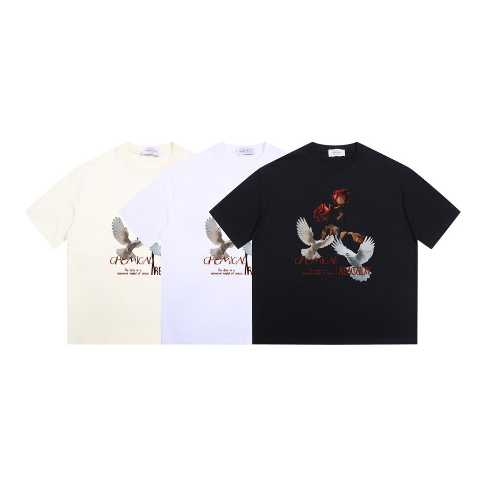 Three crew-neck graphic T-shirts shown together in cream, white, and black.