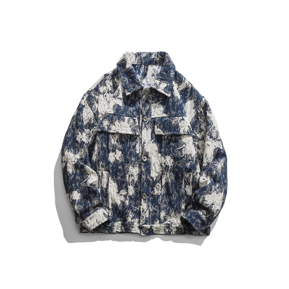 Blue and cream floral textured button-front jacket with collar and chest flap pockets, flat lay on white