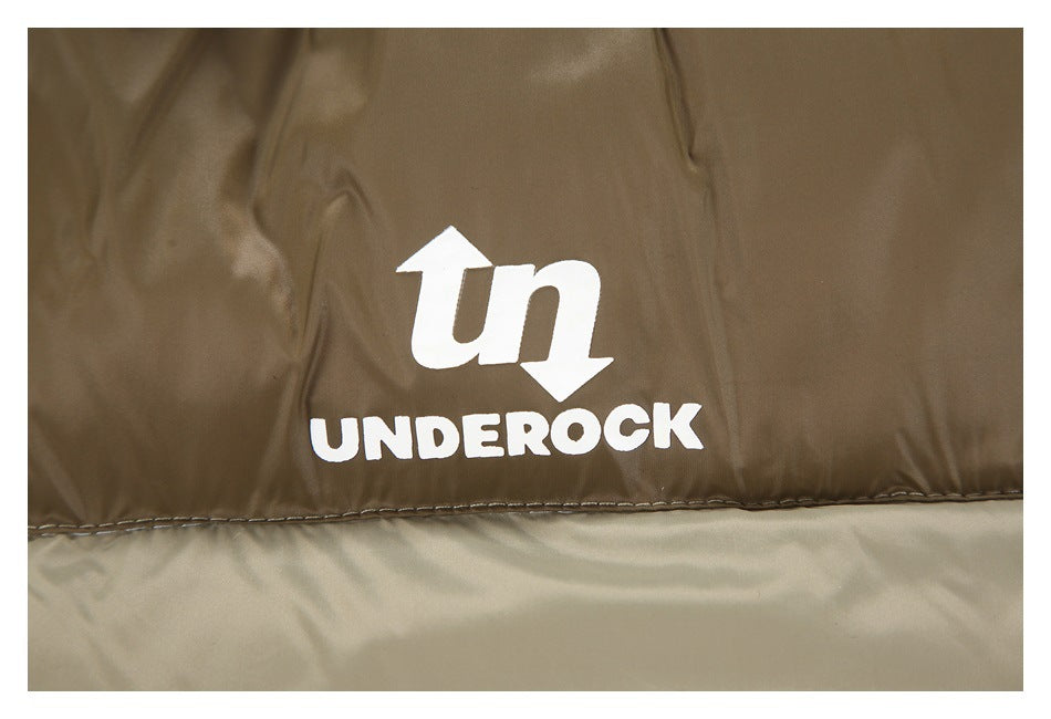 White UNDEROCK logo printed on the brown panel of a taupe puffer jacket.