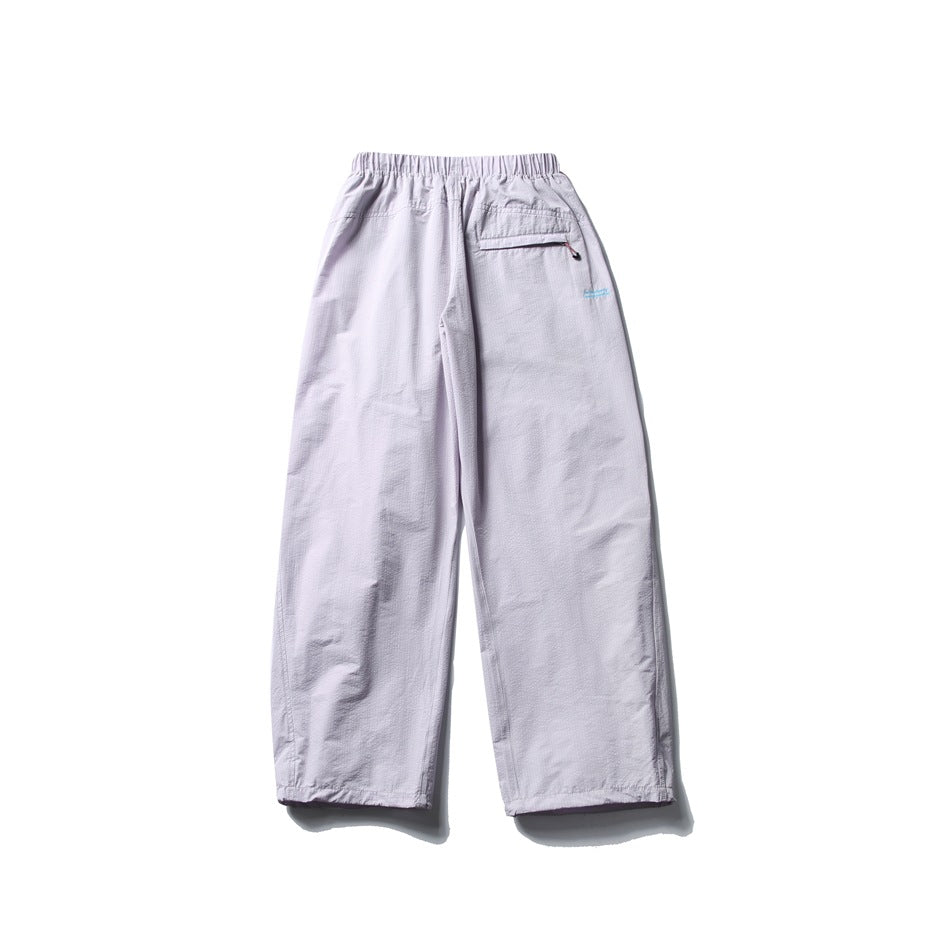 Pale lavender-gray wide-leg pants shown from the back, with an elastic waist and a zip pocket.