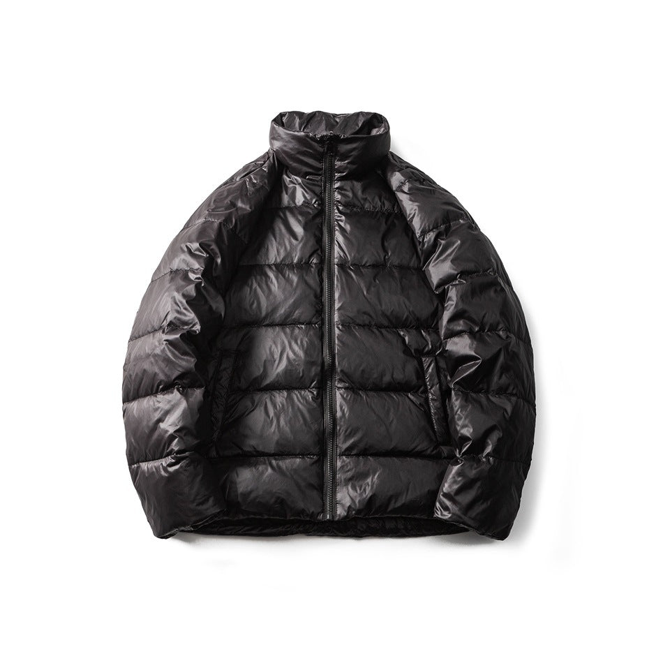 Front view of a glossy black quilted puffer jacket with a high collar, front zipper, and side pockets.