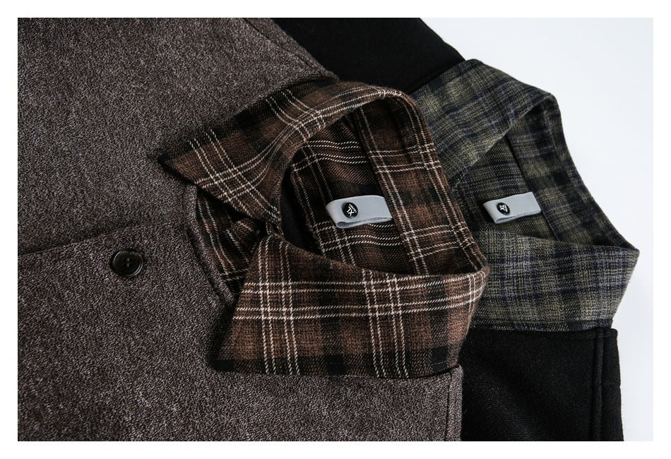 Close-up of brown and black jackets showing plaid collars, buttoned cuffs, and small interior labels.