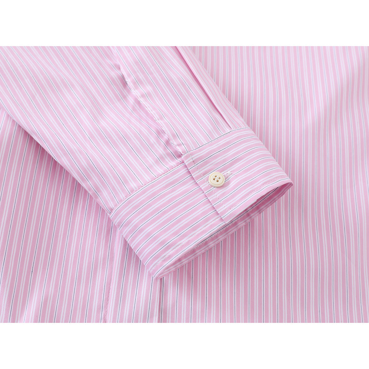Close-up of the pink-and-white striped shirt sleeve and buttoned cuff.