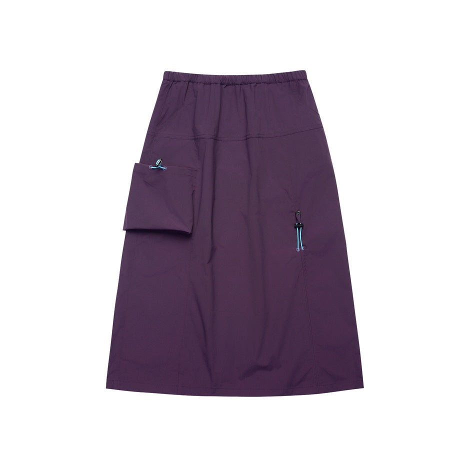 Purple midi A-line skirt with elastic waist, large side patch pocket and blue drawcord toggles, flat front view