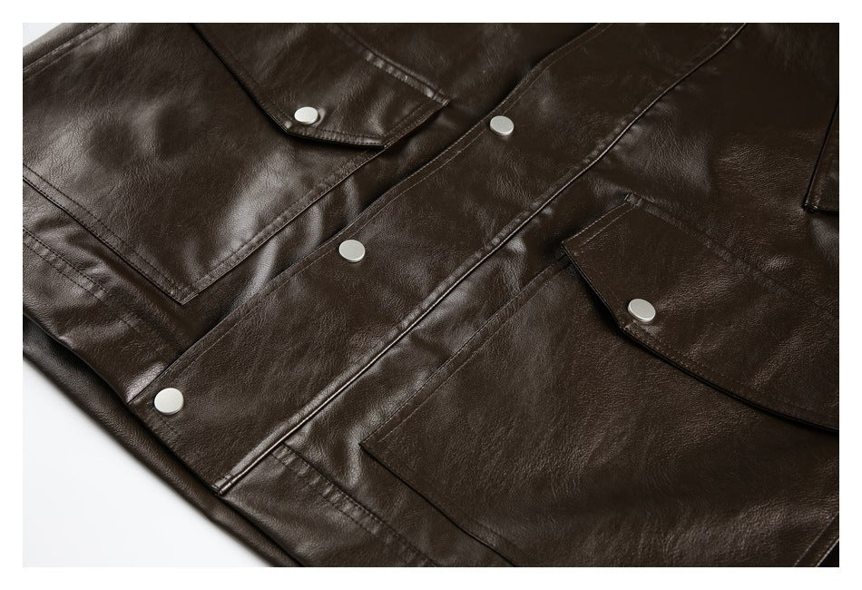Close-up of a dark brown jacket front with a snap-button placket and flap pockets.