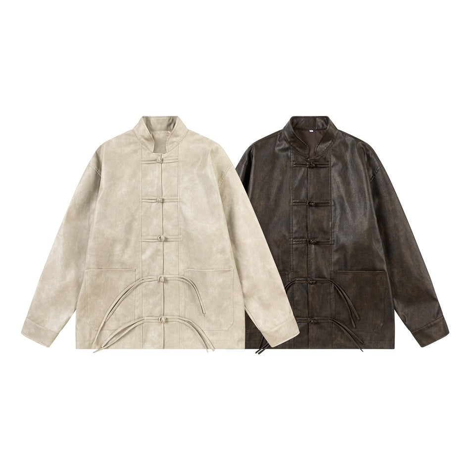 Two jackets shown flat from the front: one light beige and one dark brown, both with toggle closures and long ties.