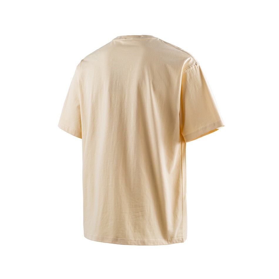 Back view of a plain light beige short-sleeve crew-neck T-shirt on a white background.