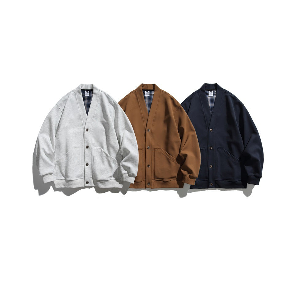 Three button-front cardigans shown from the front in light gray, brown, and dark navy.