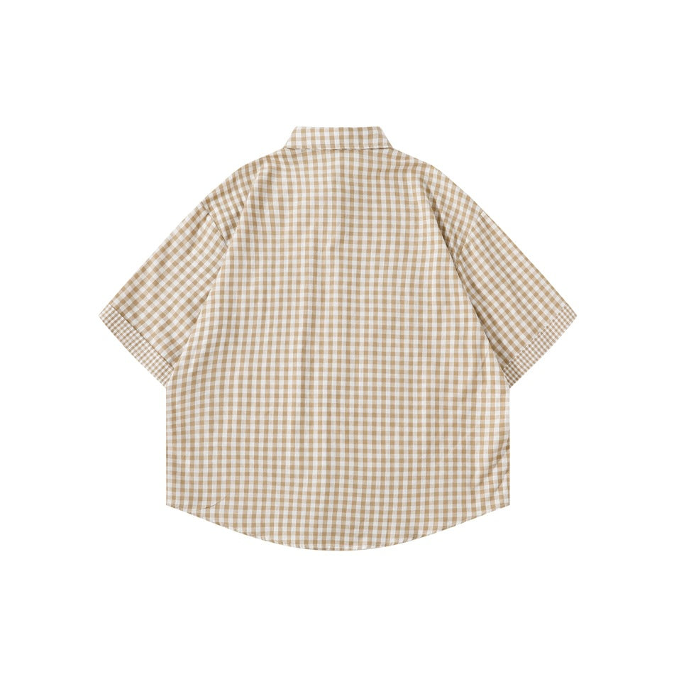 Back view of the khaki and white gingham short-sleeve shirt, flat lay, with an even check pattern and curved hem