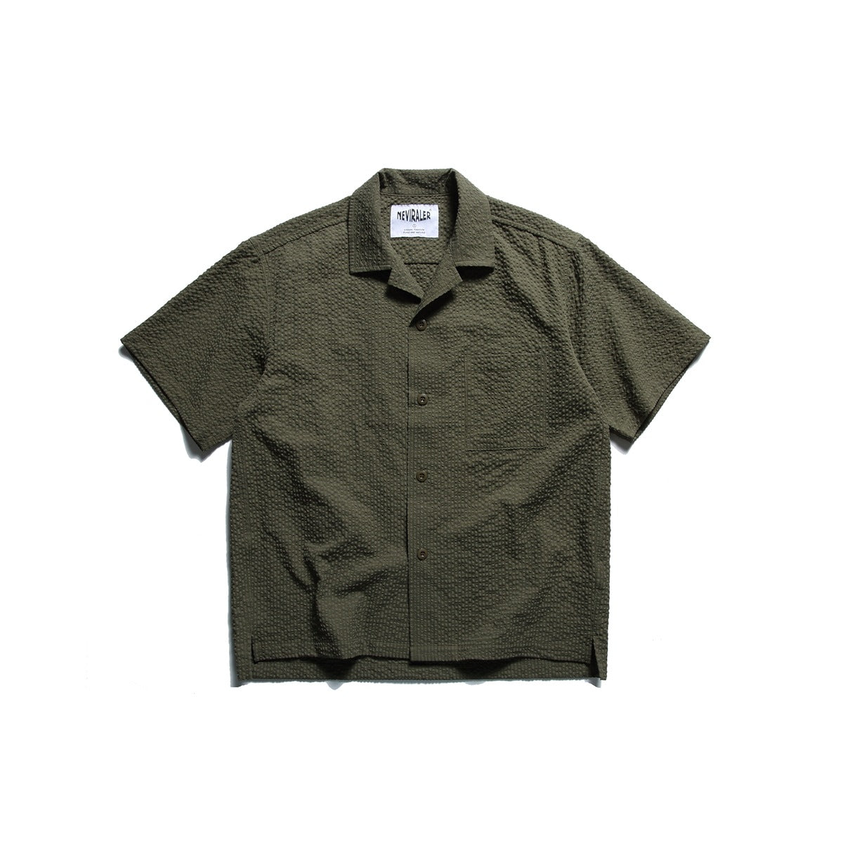 Army green short-sleeve camp-collar button-front shirt with textured fabric and chest pocket, flat lay