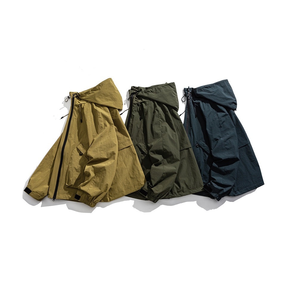 Three hooded jackets displayed together in tan, olive, and dark blue, with front zippers and pockets.