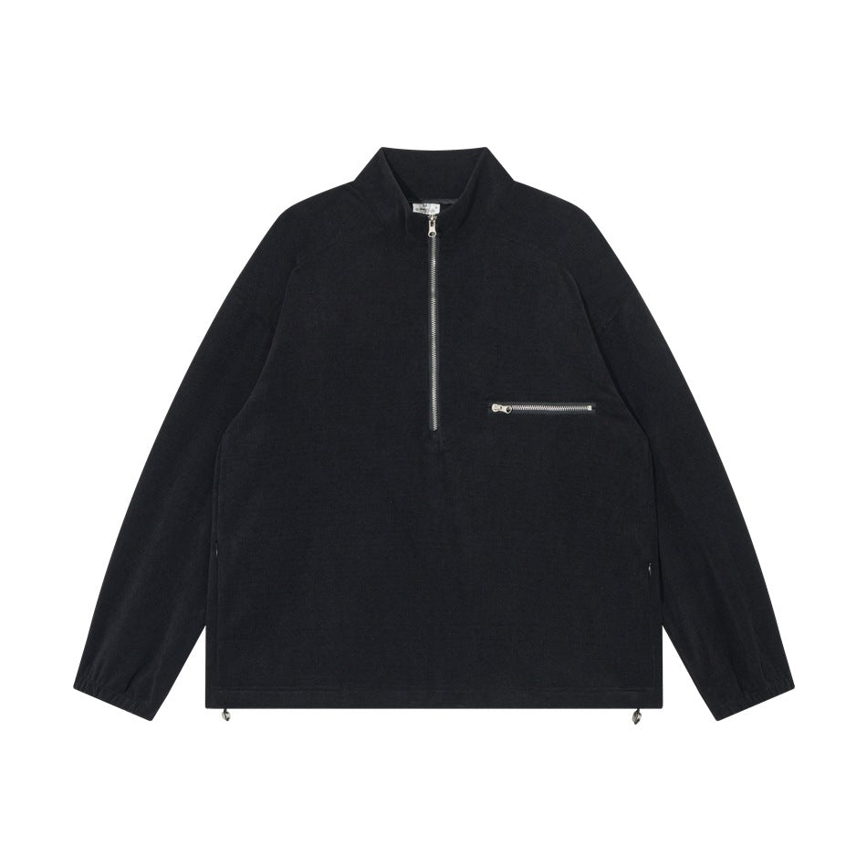 Black half-zip stand-collar pullover flat lay with chest zip pocket, elastic cuffs and hem toggles