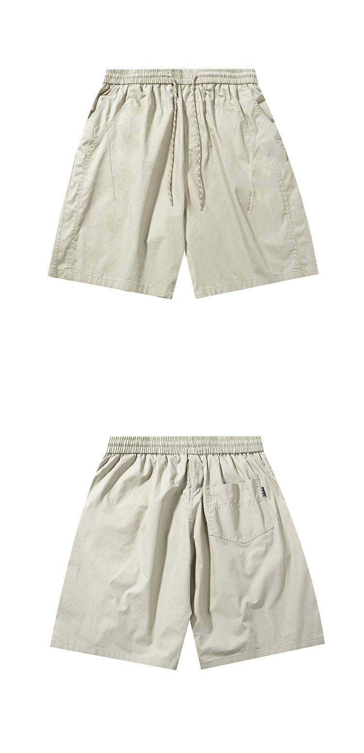 Light beige shorts shown flat from the front and back; the back view has a single pocket.