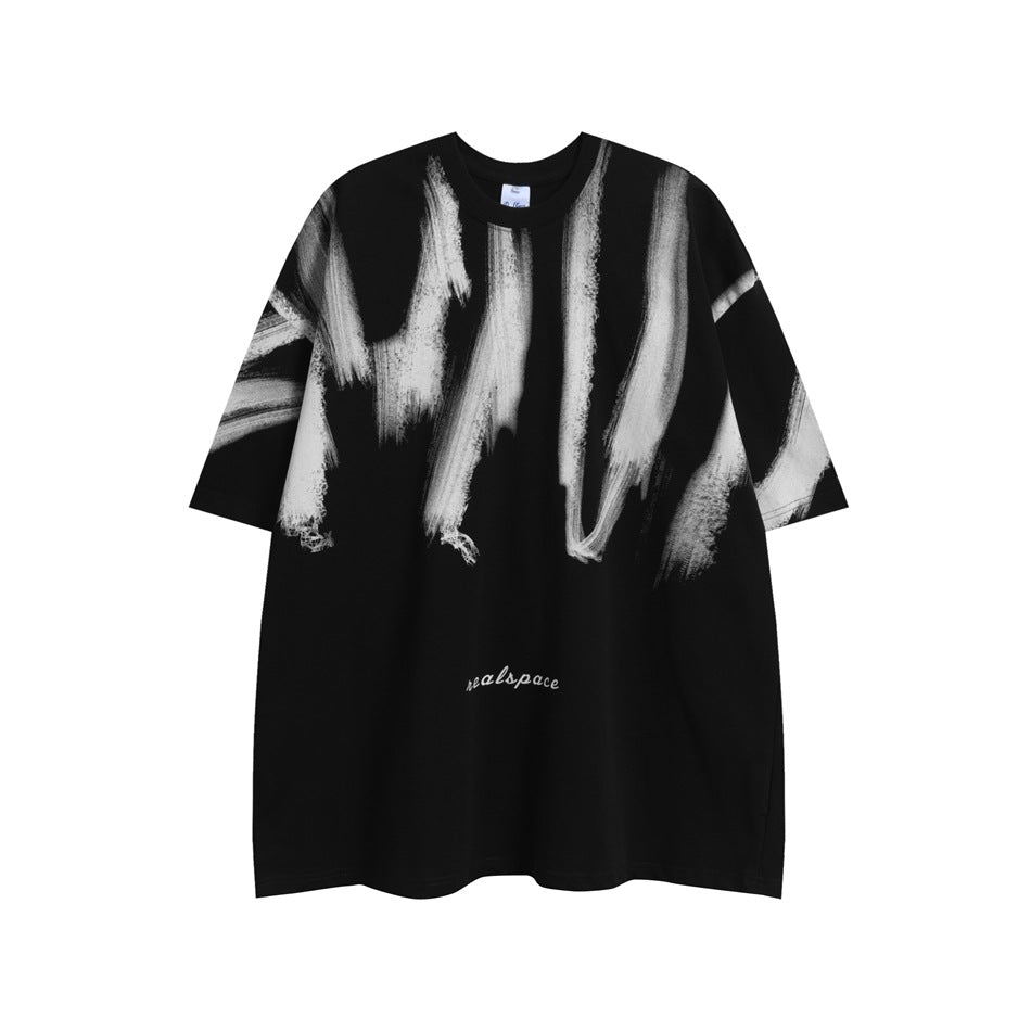 Black oversized short-sleeve T-shirt with white-gray brushstroke print on chest and sleeves, flat front view