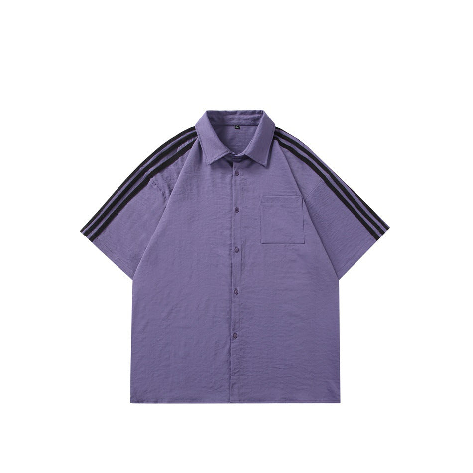 Purple short-sleeve button-up shirt with black triple stripes on the shoulders and sleeves and a chest pocket