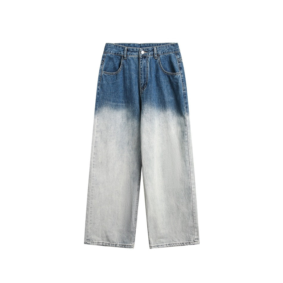 Flat front view of wide-leg jeans with a blue-to-pale gradient wash, zip fly, button and front pockets