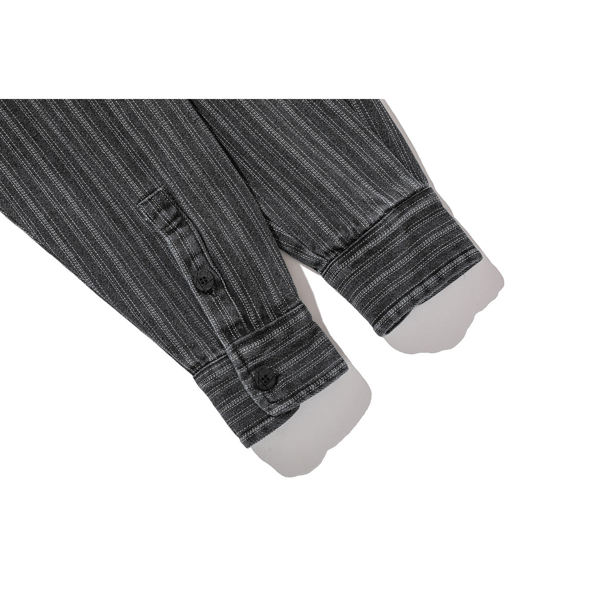 Close-up of two charcoal pinstriped shirt sleeves showing buttoned cuffs and plackets.