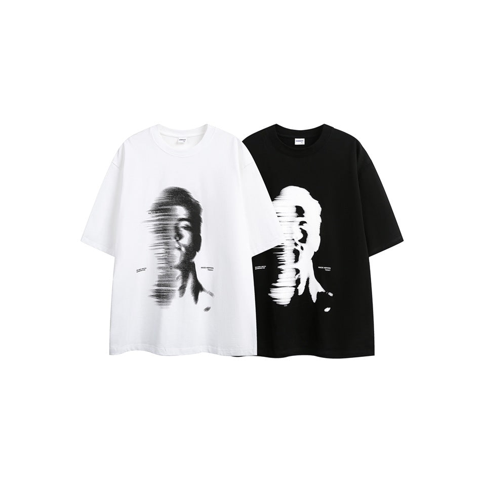 White and black short-sleeve T-shirts shown side by side, each with a contrasting distorted portrait graphic.