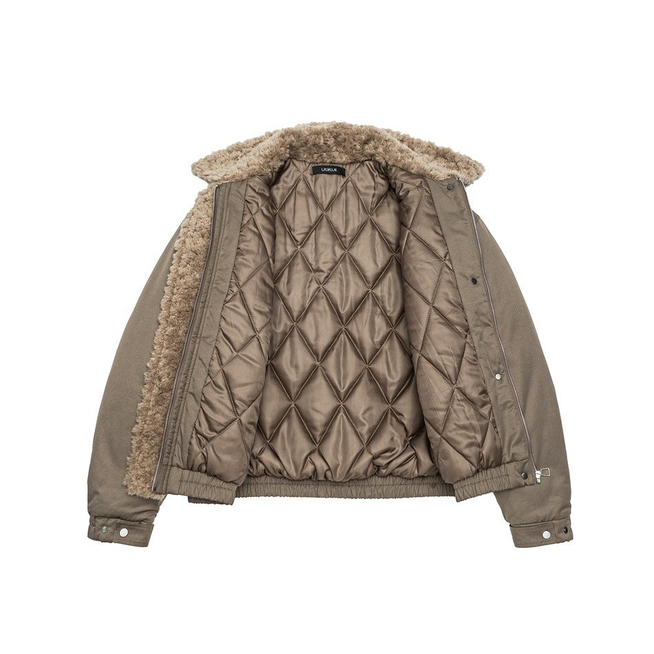 Taupe jacket laid open to show its diamond-quilted lining, plush collar, zipper, and snap cuffs.
