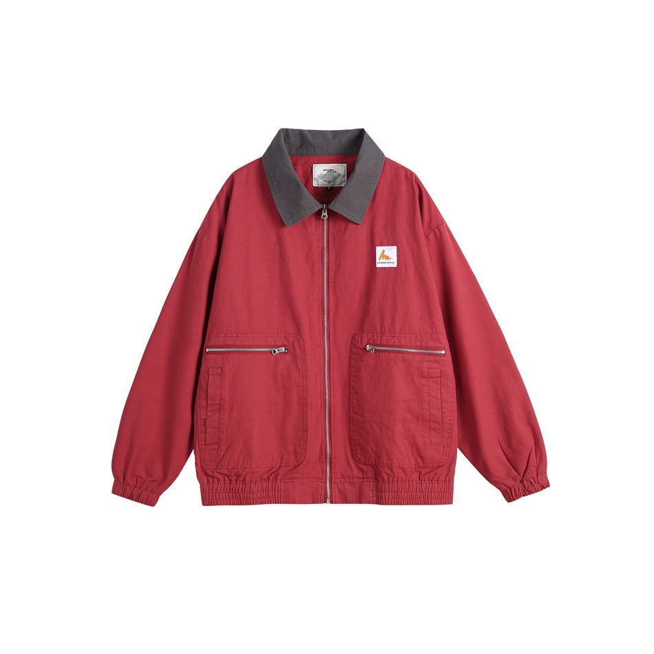 Watermelon red zip-front jacket with gray collar, two zippered patch pockets and elastic cuffs and hem, flat view