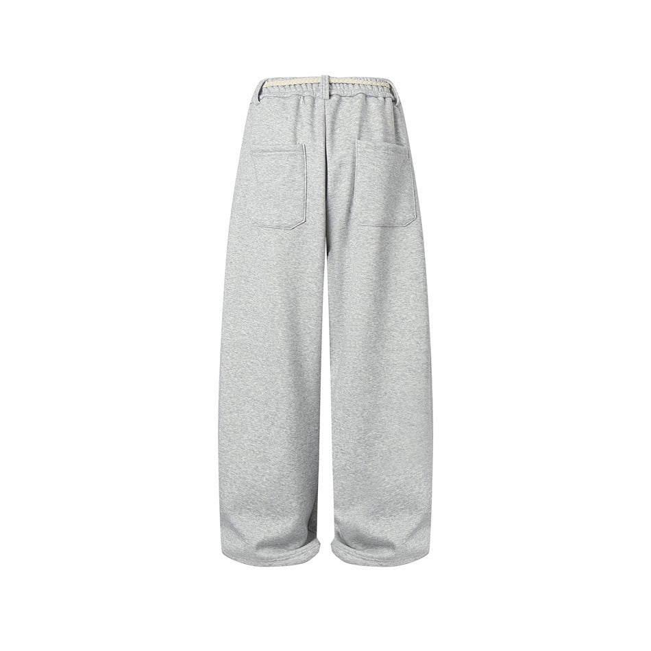 Back view of heather gray wide-leg sweatpants with elastic waistband, rope detail and two patch pockets