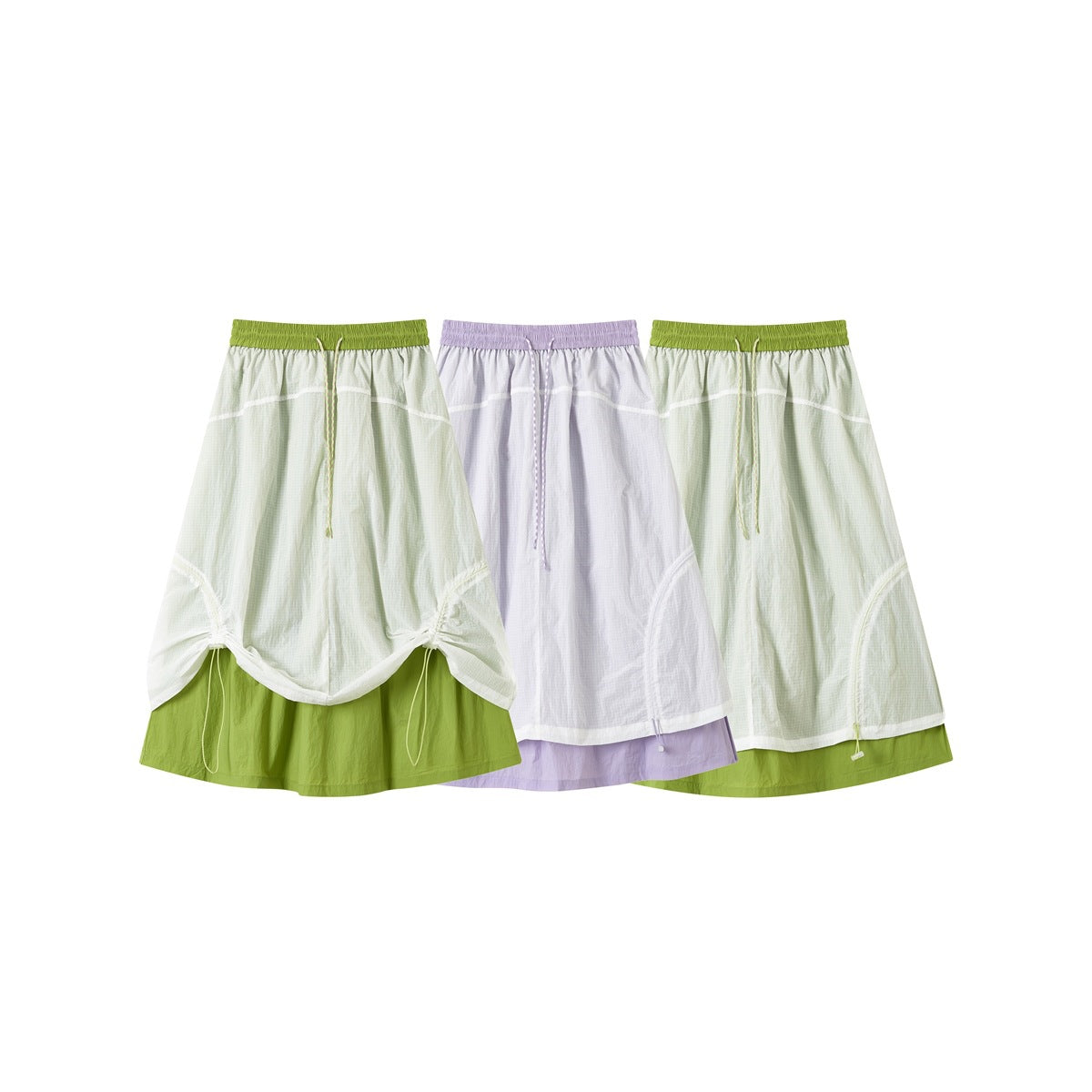 Three layered skirts shown together in pale green with lime, lavender, and pale green color combinations.