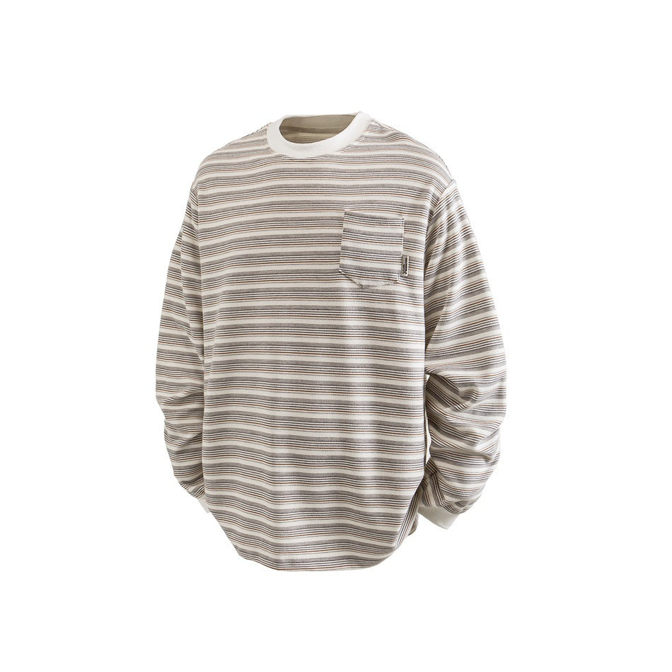 Cream striped long-sleeve crew neck top with gray and tan lines, ribbed collar and cuffs, and chest pocket