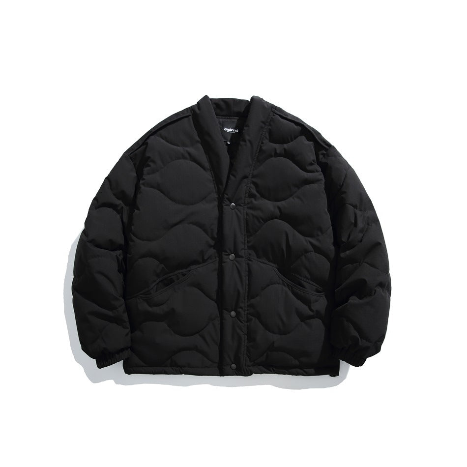 Black quilted V-neck jacket with wavy stitching, snap front and slanted pockets, flat lay front view
