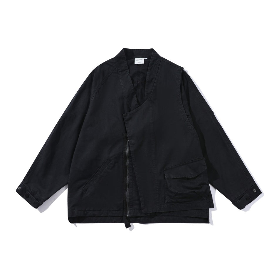 Black stand-collar jacket flat lay with asymmetric front zipper, flap pocket and snap cuffs
