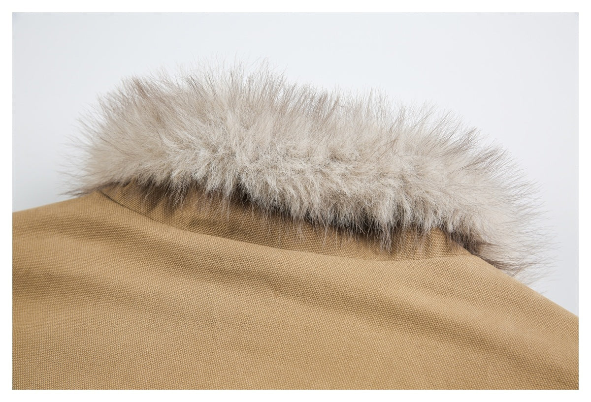 Close-up of a tan coat collar edged with fluffy light gray-beige fur.