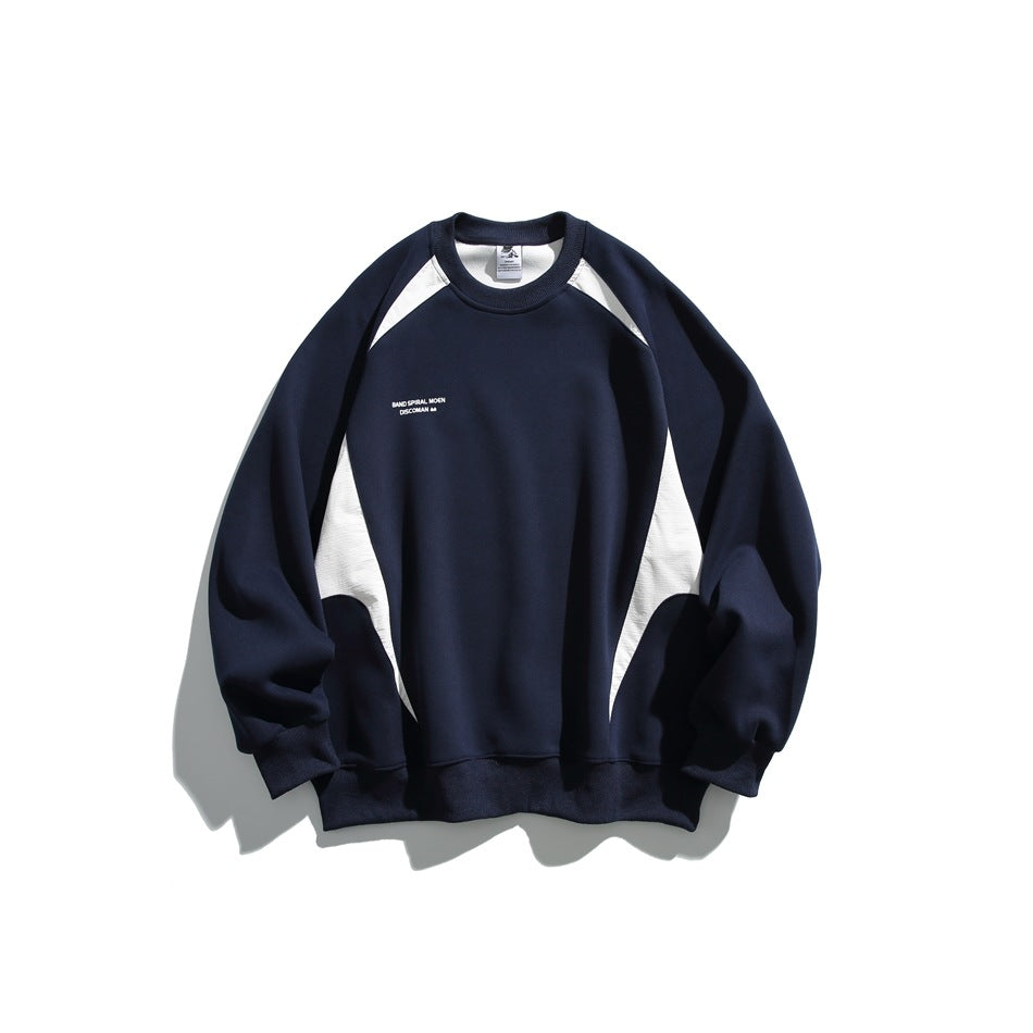 Front view of a navy raglan crewneck sweatshirt with white shoulder and side panels and small chest lettering.