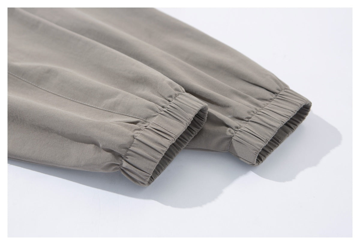 Close-up of the taupe-gray jacket's elasticated sleeve cuffs.