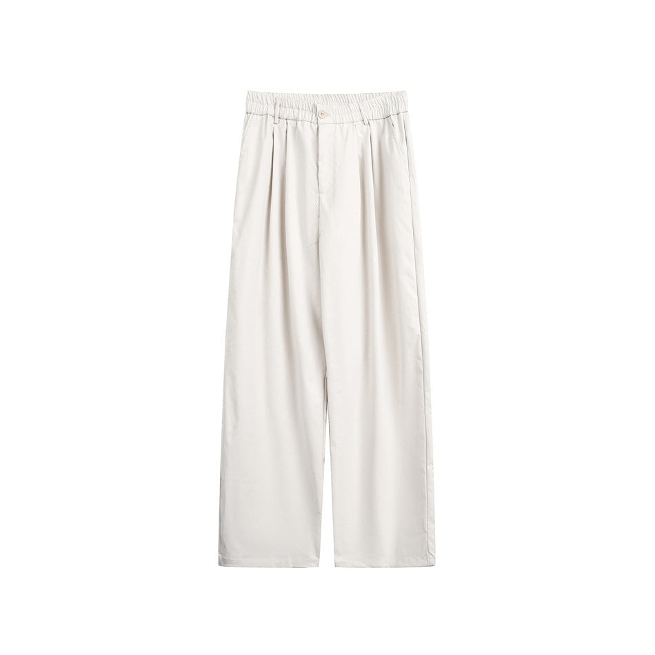Off-white wide-leg pleated trousers with elastic waistband and front button, flat front view