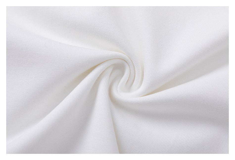 Close-up of the white T-shirt fabric gathered into a twist.