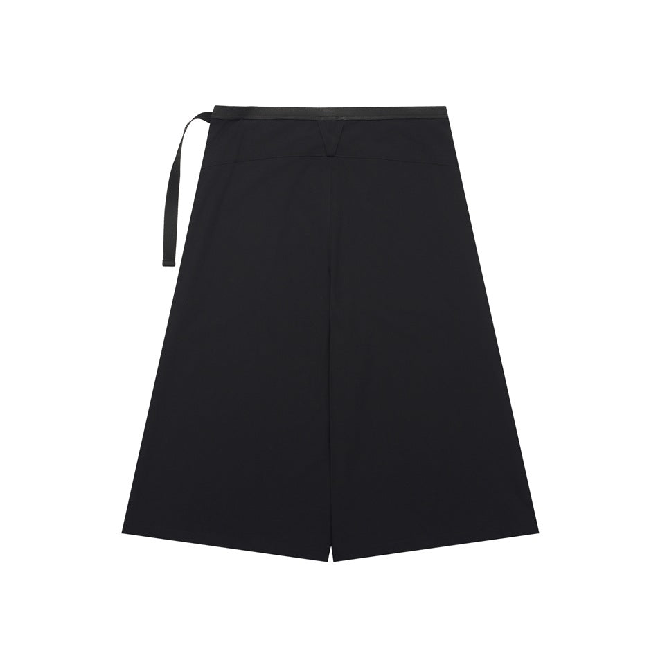 Black A-line wrap skirt shown flat, with a wide waistband, center seam, and long side tie.