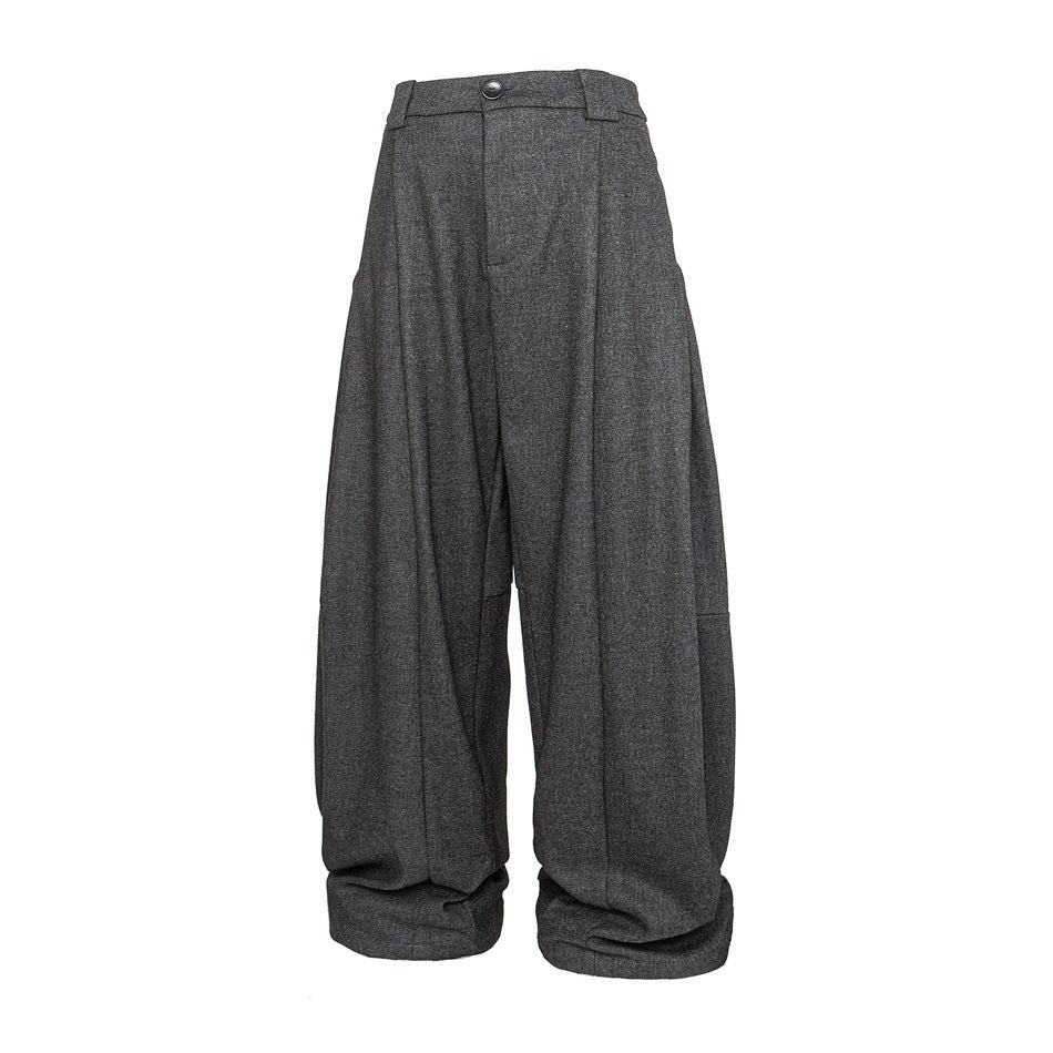 Heathered gray wide-leg pleated trousers with button waistband and cuffed hems, front view