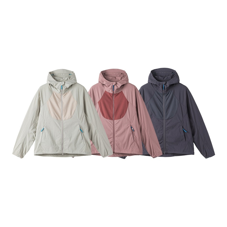 Three hooded jackets shown from the front in pale sage, dusty rose, and charcoal, with contrasting chest panels.