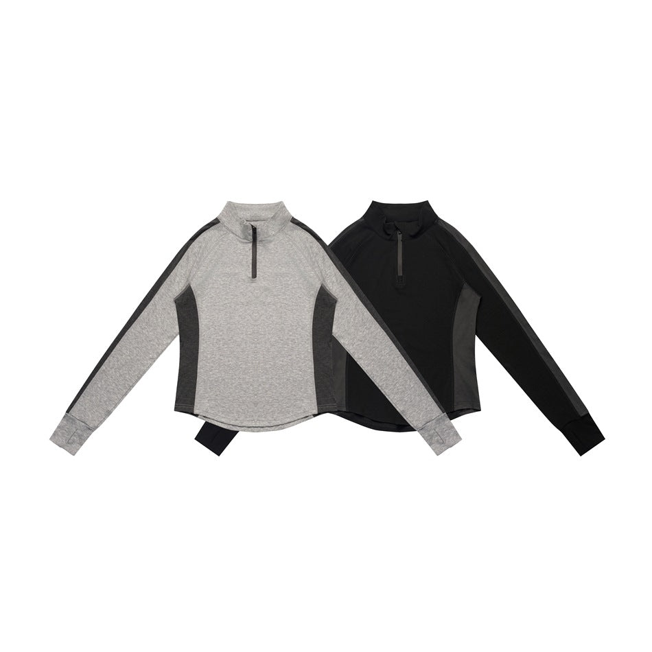 Front view of two long-sleeve quarter-zip tops, one heather gray with charcoal panels and one black with gray panels.