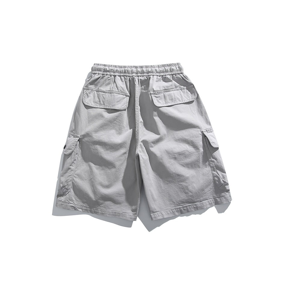 Light gray cargo shorts shown from the back, with an elastic waistband, two flap pockets and side cargo pockets.