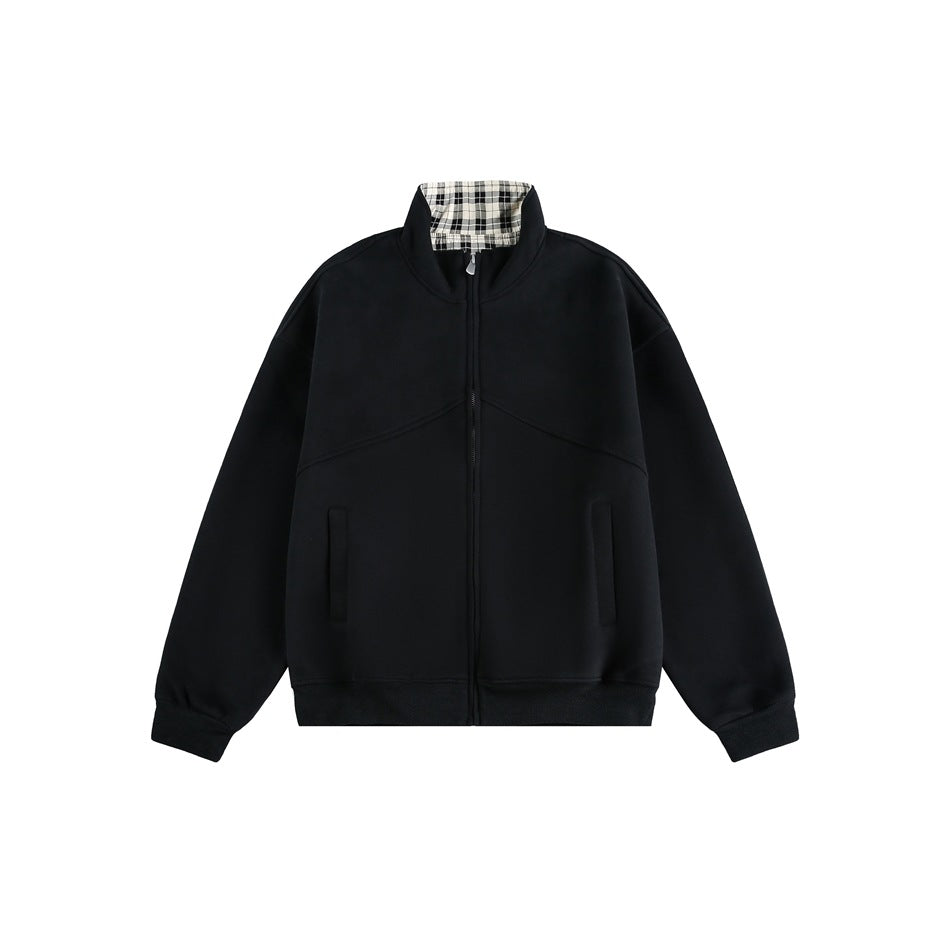 Black zip-front stand-collar jacket with plaid collar lining, ribbed cuffs and hem, and slanted front pockets