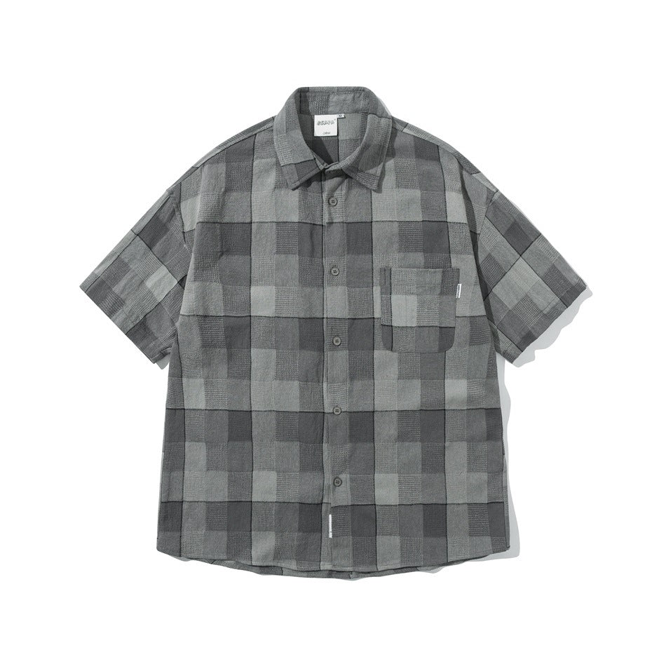 Tonal gray check short-sleeve button-up shirt with chest pocket, flat front view