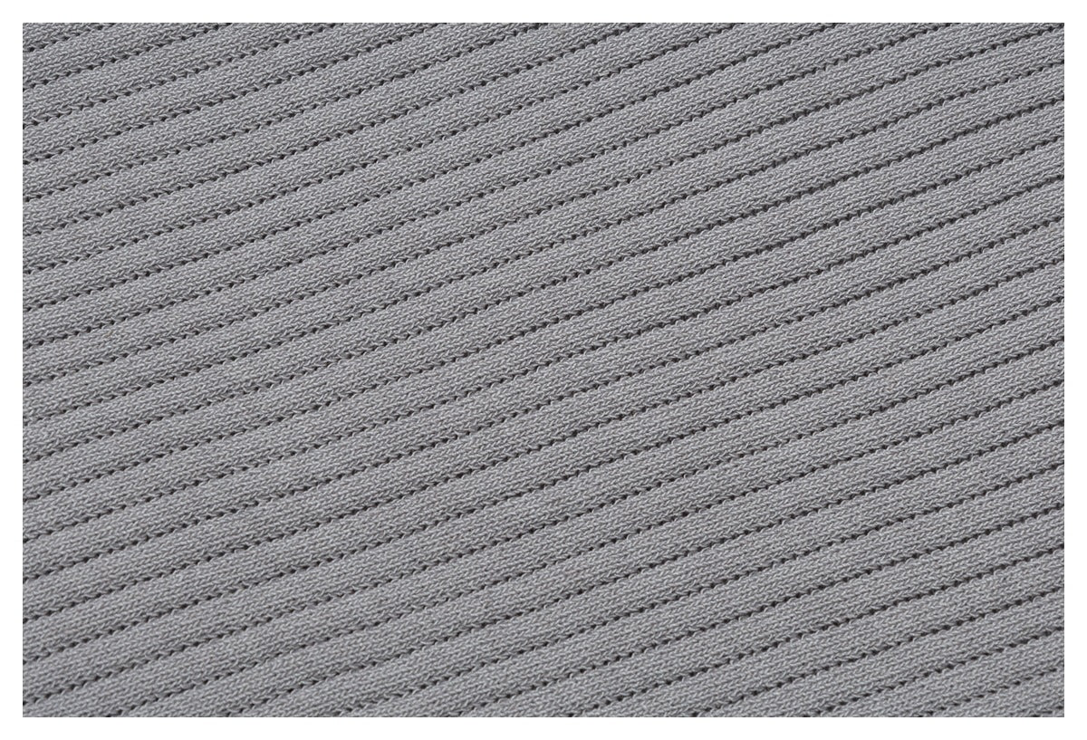 Macro view of the light gray knit fabric, showing its narrow raised ribs and open stitch texture.
