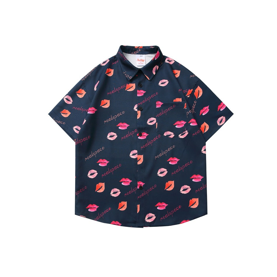 Navy blue short-sleeve button-up shirt with all-over pink and orange lip and script print, flat lay front view