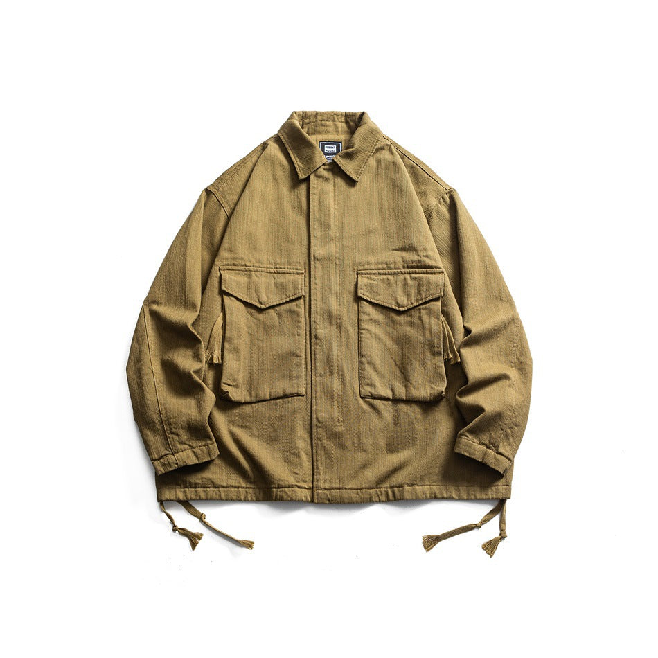 Khaki collared jacket flat lay with two large flap chest pockets and tasseled hem drawcords