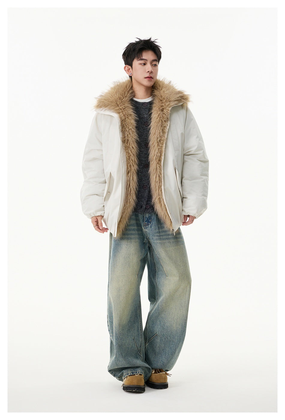Full-length model wearing an ivory jacket with a wide tan faux-fur collar and oversized sleeves.