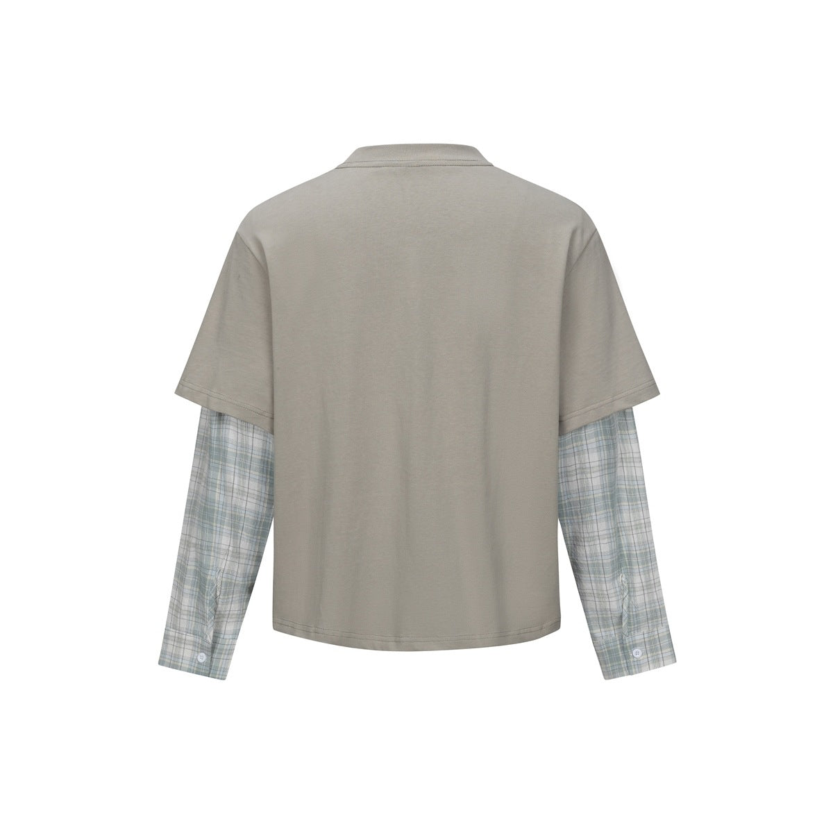 Back view of a taupe short-sleeve T-shirt layered over pale blue-gray plaid long sleeves.