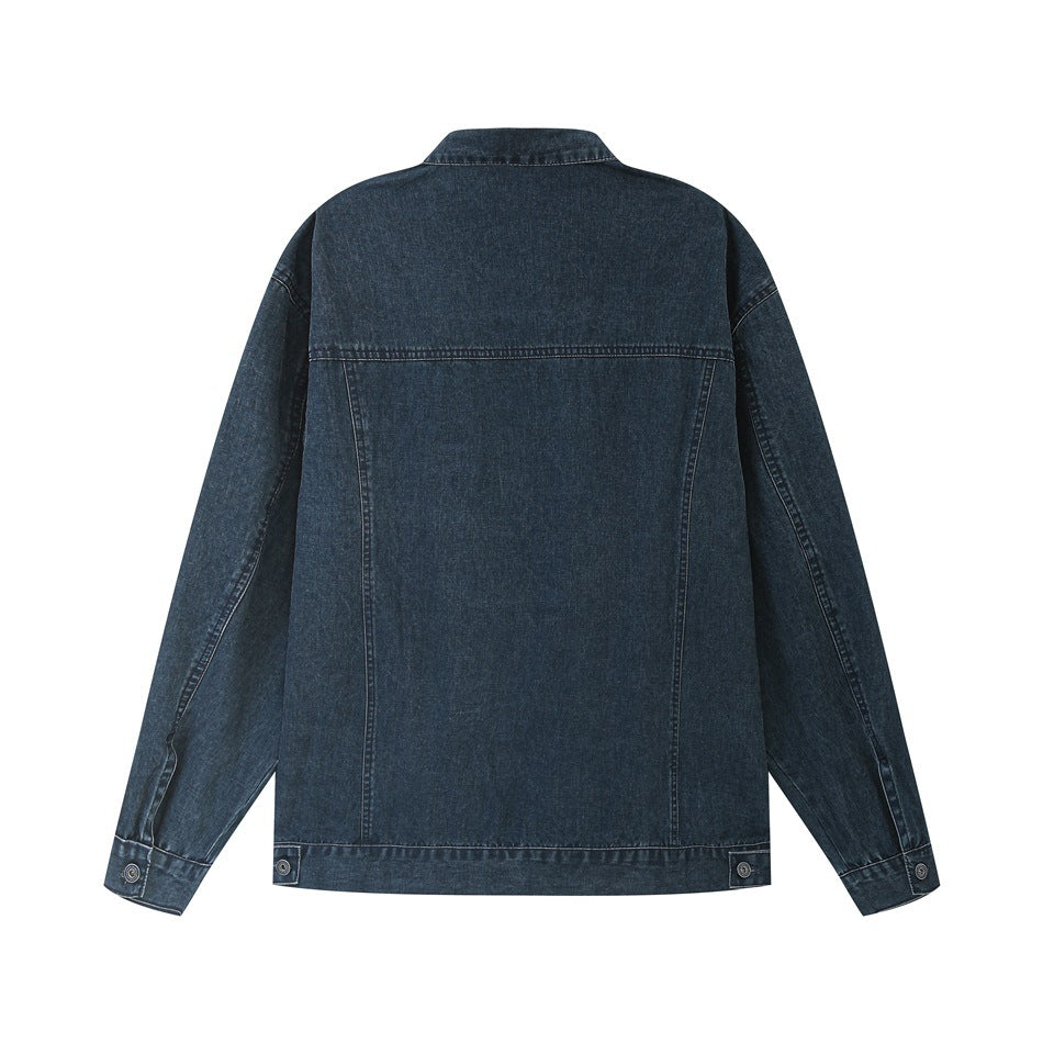 Back view of navy washed denim jacket with back yoke seam, vertical seams and buttoned waist tabs