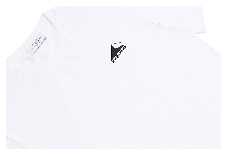 Close-up of a white T-shirt with a small black chest logo and visible crew neckline.