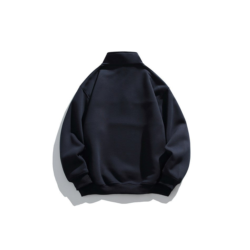Back view of a plain black quarter-zip sweatshirt laid flat.