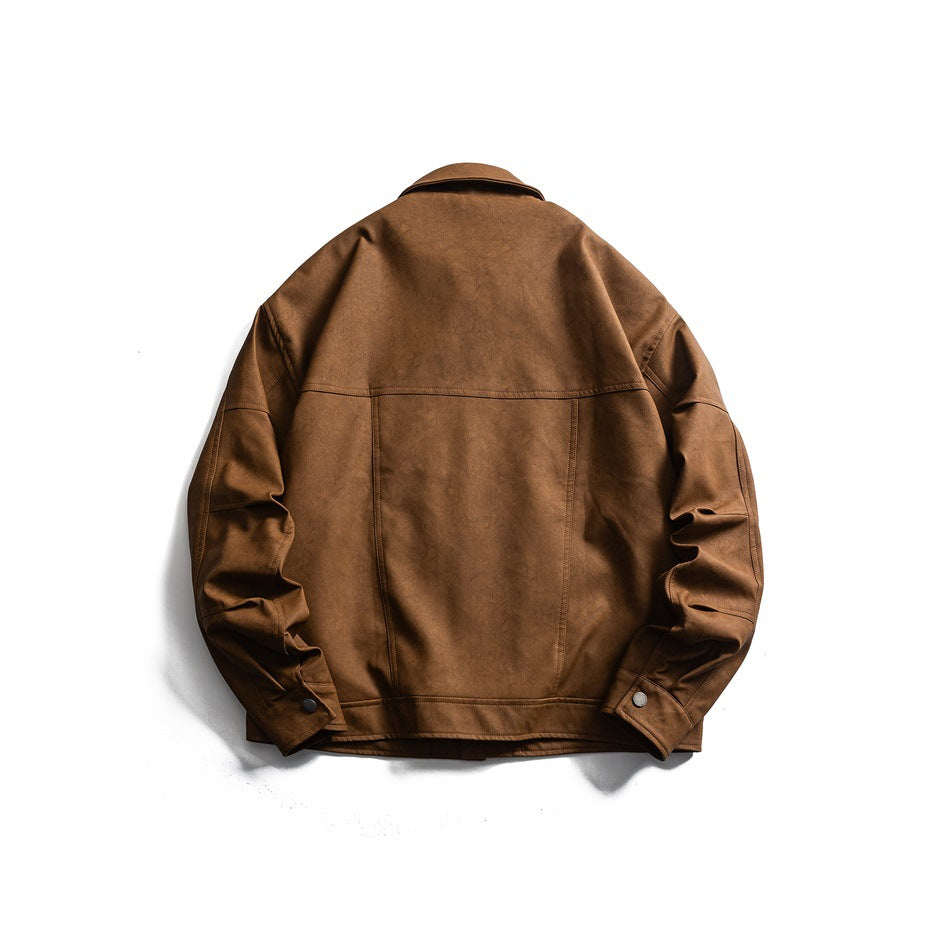 Back view of a brown collared jacket laid flat, showing panel seams, long sleeves, and button cuffs.